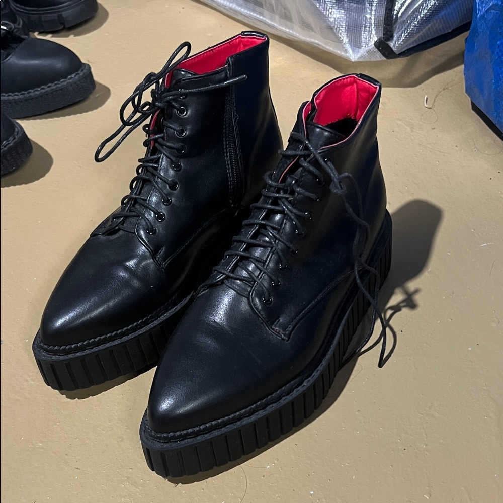 Elegant Black Leather Women's Boots with Red Interior